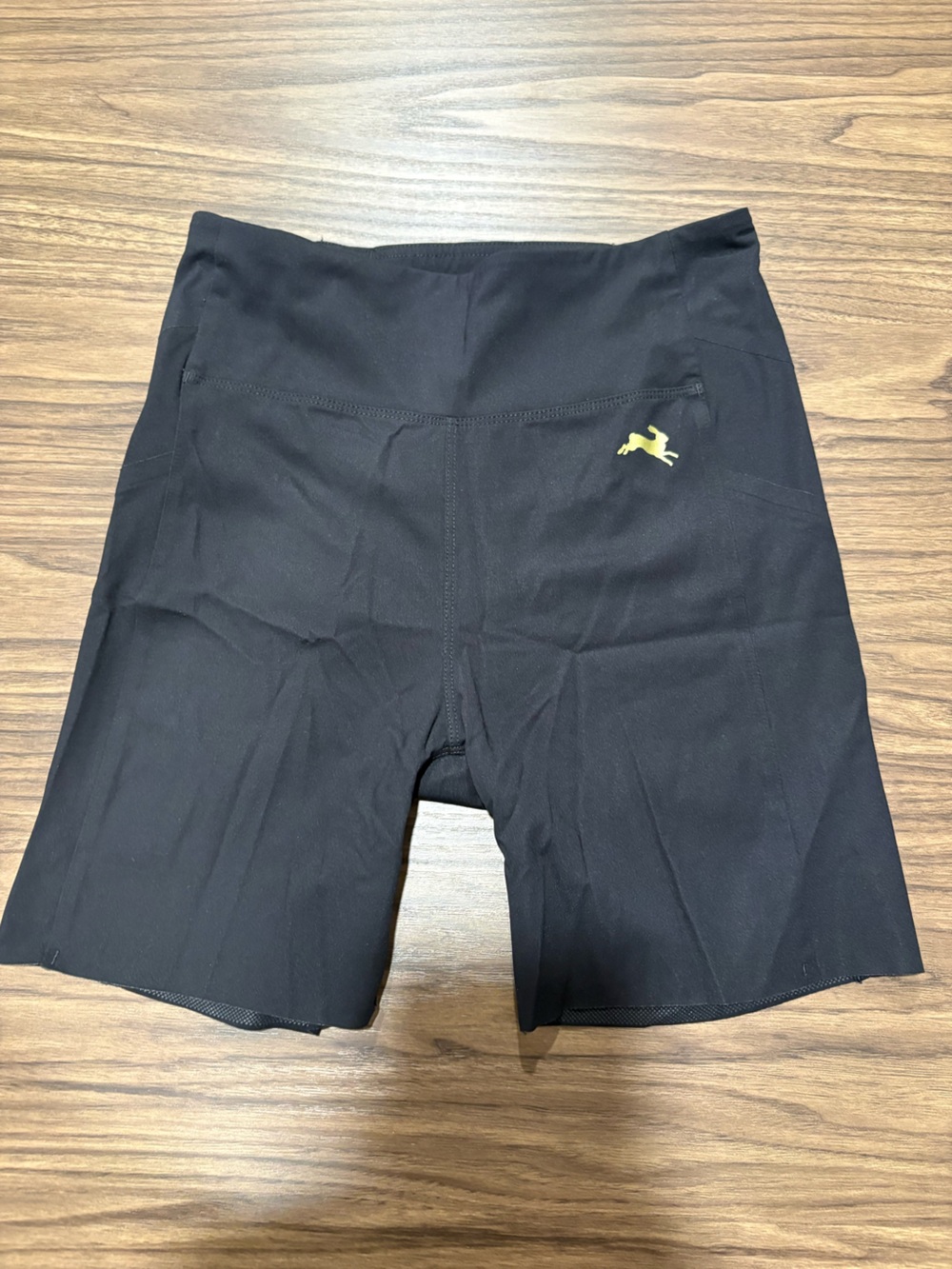 Tracksmith Black Shorts with Small Yellow-Gold Logo